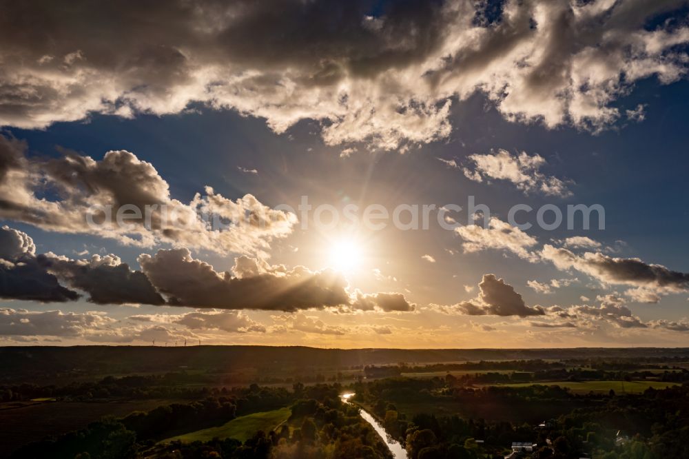 Aerial image Schiffmühle - Weather situation with cloud formation and light reflections at sunrise in Schiffmuehle in the state Brandenburg, Germany