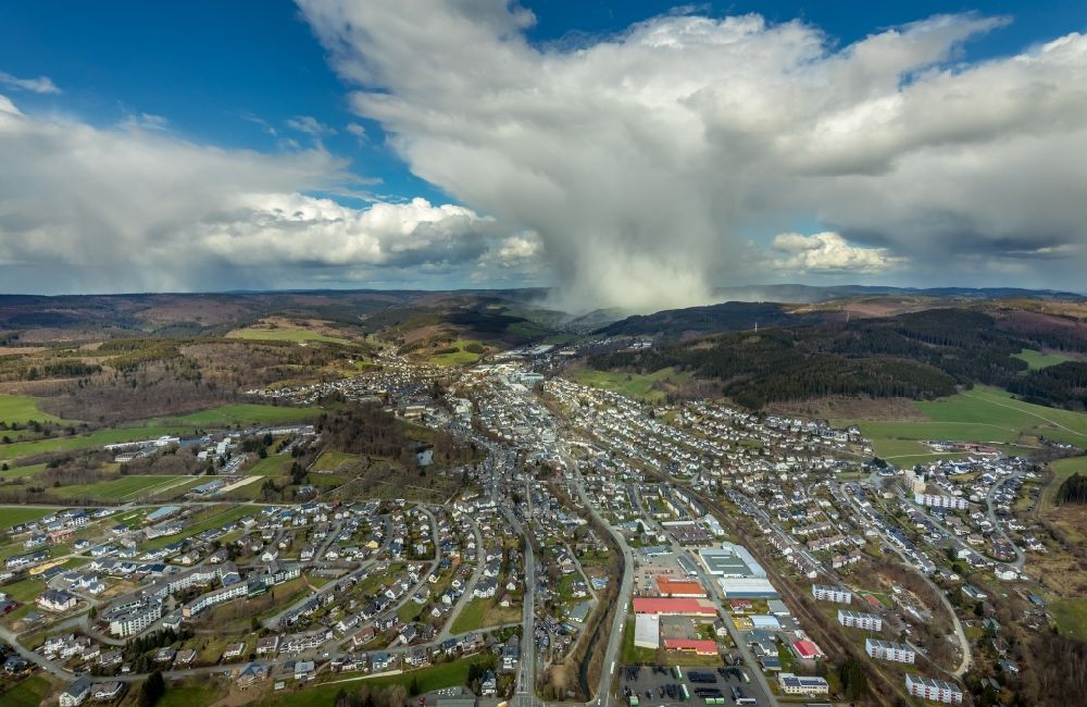 Bad Berleburg from the bird's eye view: Weather conditions with cloud formation in the district Am Stoeppelsweg in Bad Berleburg in the state North Rhine-Westphalia, Germany