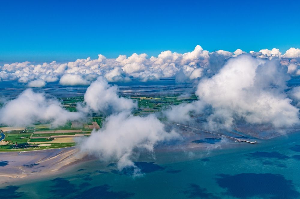 Pellworm from the bird's eye view: Weather conditions with cloud formation in Pellworm North Frisia in the state Schleswig-Holstein, Germany