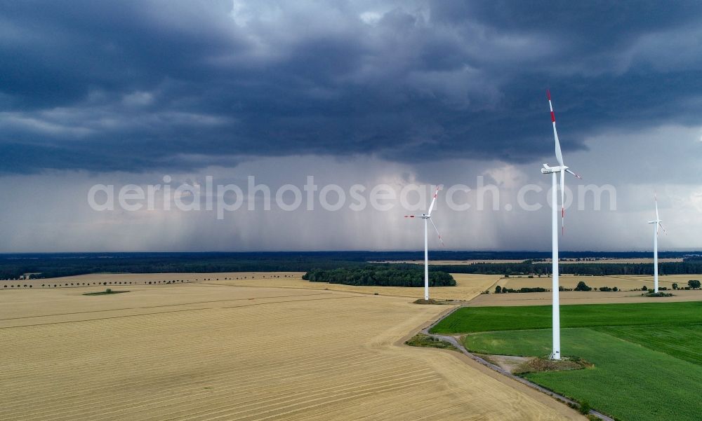 Aerial photograph Petersdorf - Weather conditions with cloud formation an approaching rainy area over fields in Petersdorf in the state Brandenburg, Germany