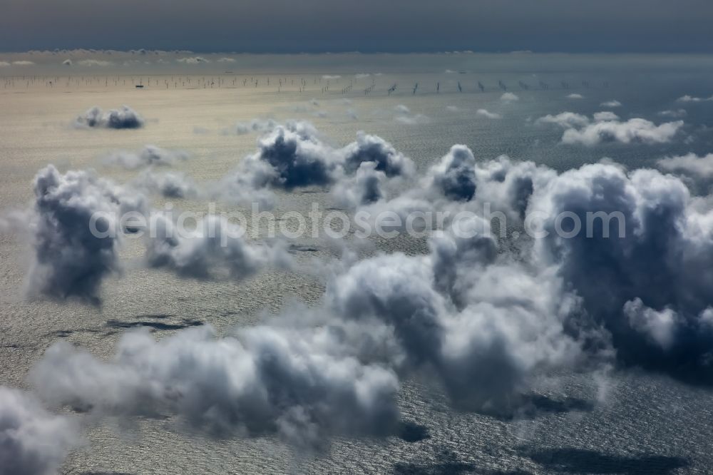 Wittdün auf Amrum from the bird's eye view: Weather conditions with cloud formation above the water surface of the North Sea in Wittduen auf Amrum in the state Schleswig-Holstein, Germany