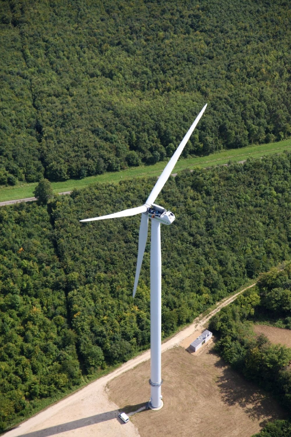 Aerial photograph Amelecourt - Wind energy plants (WEA) with wind power plants of Iberdrola SA in a forest area in Amelecourt in Grand Est, France