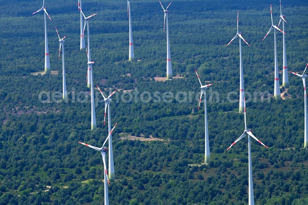 Jänickendorf from above - Wind energy plants (WEA) with wind power plants in a forest area in Jaenickendorf Nuthe-Urstromtal in the state Brandenburg, Germany