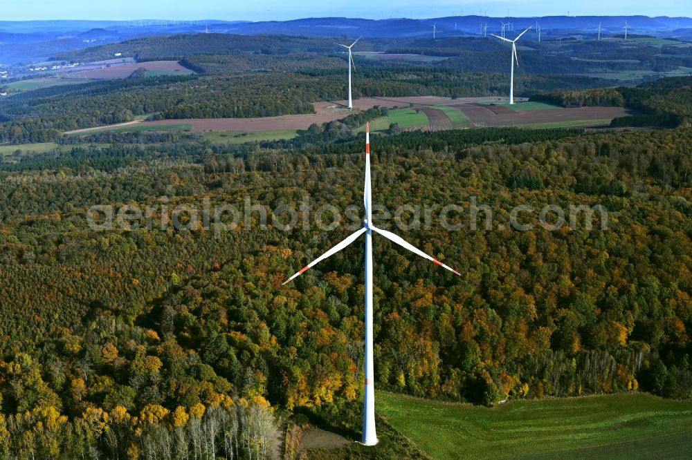 Steinbach from the bird's eye view: Wind energy plants (WEA) with wind power plants in a forest area in Steinbach in the state Saarland, Germany