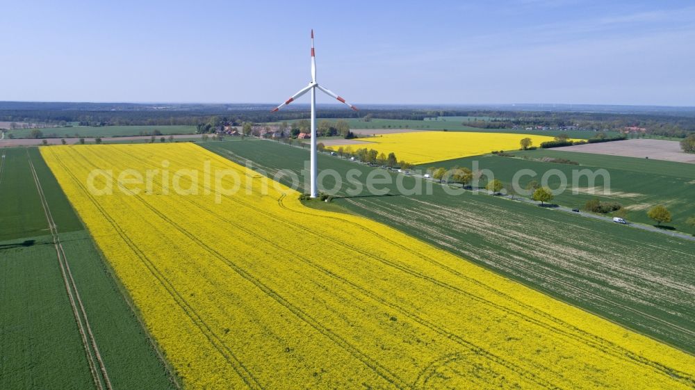 Aerial photograph Reinstorf - Wind turbine windmill on a field in Suelbeck in the state Lower Saxony
