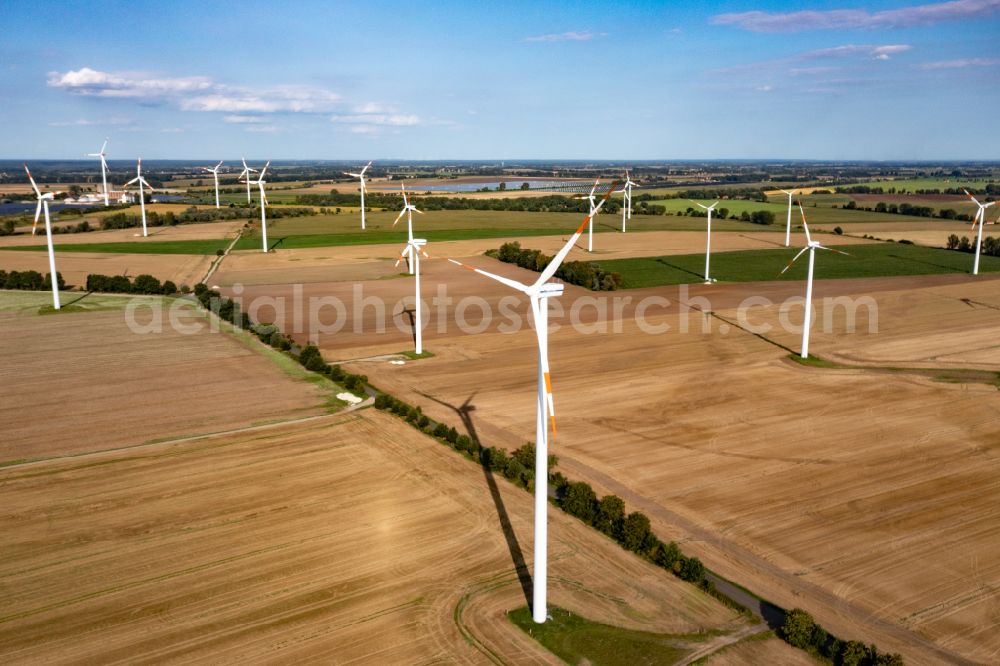 Bliesdorf from the bird's eye view: Wind turbine windmills on a field in Bliesdorf in the state Brandenburg, Germany