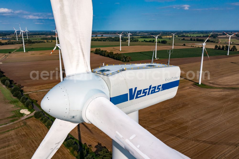 Aerial image Bliesdorf - Wind turbine windmills on a field in Bliesdorf in the state Brandenburg, Germany