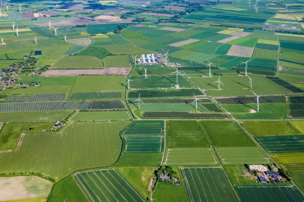 Aerial image Bosbüll - Wind turbine windmills on a field in Bosbuell in the state Schleswig-Holstein, Germany
