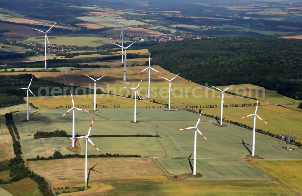 Aerial photograph Bucha - Wind turbine windmills on a field on street Dorfstrasse in Bucha in the state Thuringia, Germany