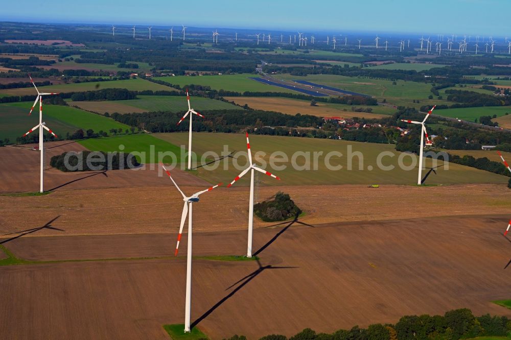 Grabow-Buckow from the bird's eye view: Wind turbine windmills on a field in Grabow-Buckow in the state Brandenburg, Germany