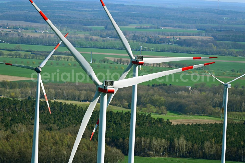 Halenbeck from the bird's eye view: Wind turbine windmills on a field in Halenbeck in the state Brandenburg, Germany