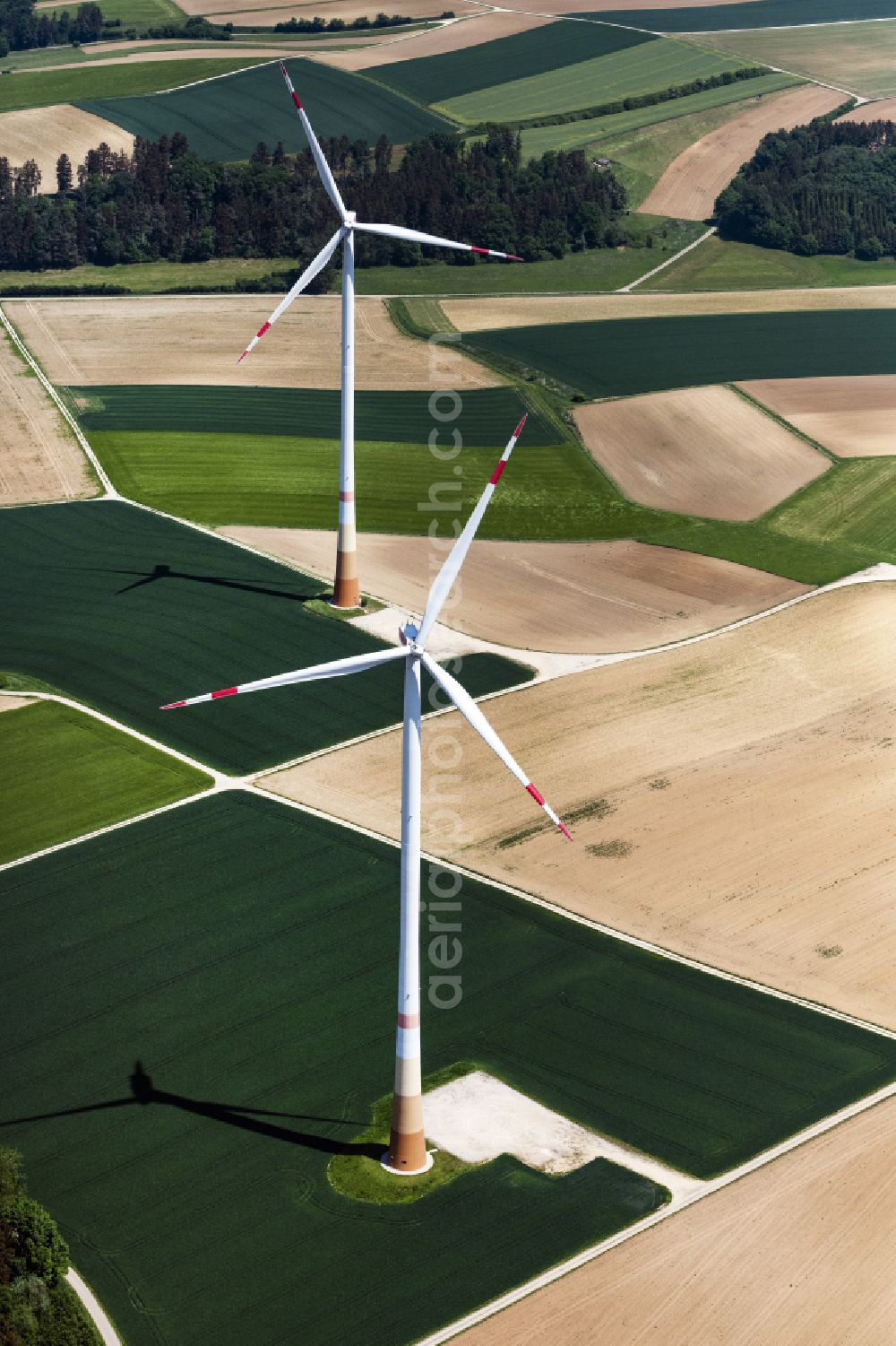 Holzheim from the bird's eye view: Wind turbine windmills on a field in Holzheim in the state Bavaria, Germany