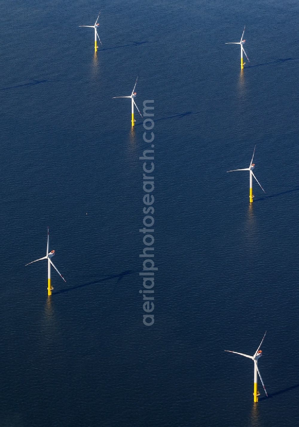 Nordergründe from above - Wind turbines of the offshore wind farm on the water surface of North Sea in Nordergruende in the state Lower Saxony, Germany