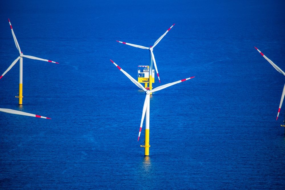 Butjadingen from the bird's eye view: Wind turbines of the offshore wind farm on the water surface of North Sea in Nordergruende in the state Lower Saxony, Germany