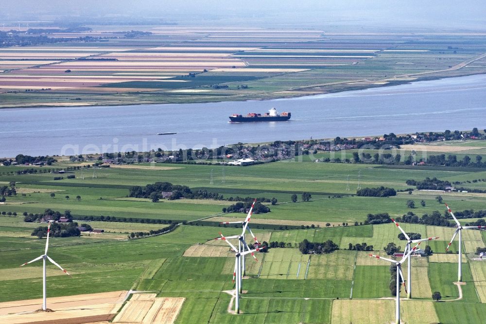 Aerial photograph Brokreihe - Wind turbine windmills on a field in Brokreihe in the state Schleswig-Holstein, Germany