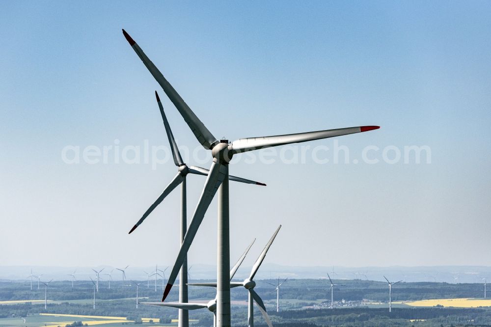 Daxweiler from the bird's eye view: Wind turbine windmills on a field in Daxweiler in the state Rhineland-Palatinate, Germany