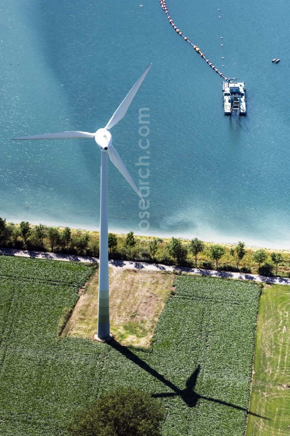 Aerial image Emmerich am Rhein - Wind turbine windmills on a field in Emmerich am Rhein in the state North Rhine-Westphalia, Germany