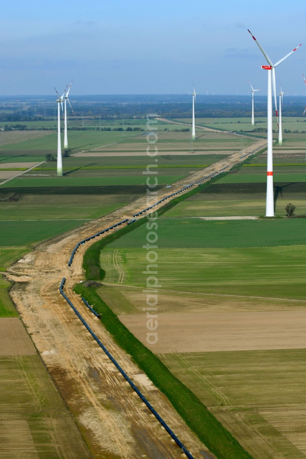 Rehfelde from the bird's eye view: Wind turbine windmills on a field in the district Zinndorf in Rehfelde in the state Brandenburg, Germany