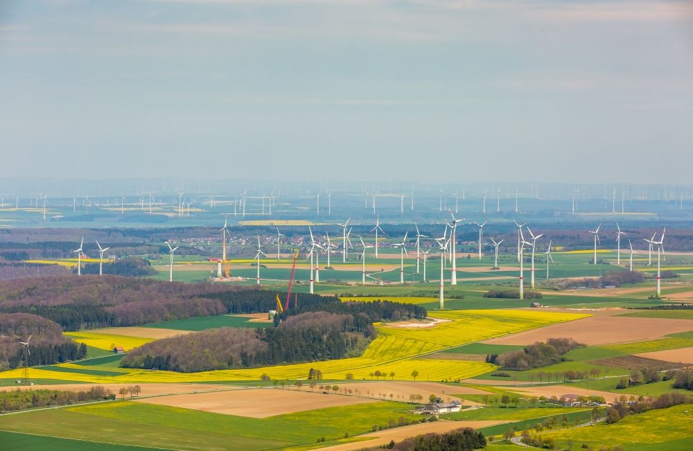 Rösenbeck from the bird's eye view: Wind turbine windmills on a field in Roesenbeck in the state North Rhine-Westphalia, Germany