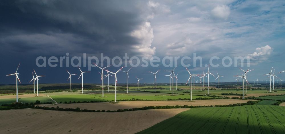 Aerial photograph Sieversdorf - Wind turbine windmills on a field in Sieversdorf in the state Brandenburg, Germany