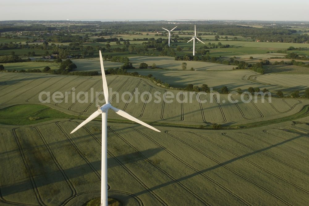Tüttendorf from the bird's eye view: Wind turbine windmills on a field in Tuettendorf in the state Schleswig-Holstein