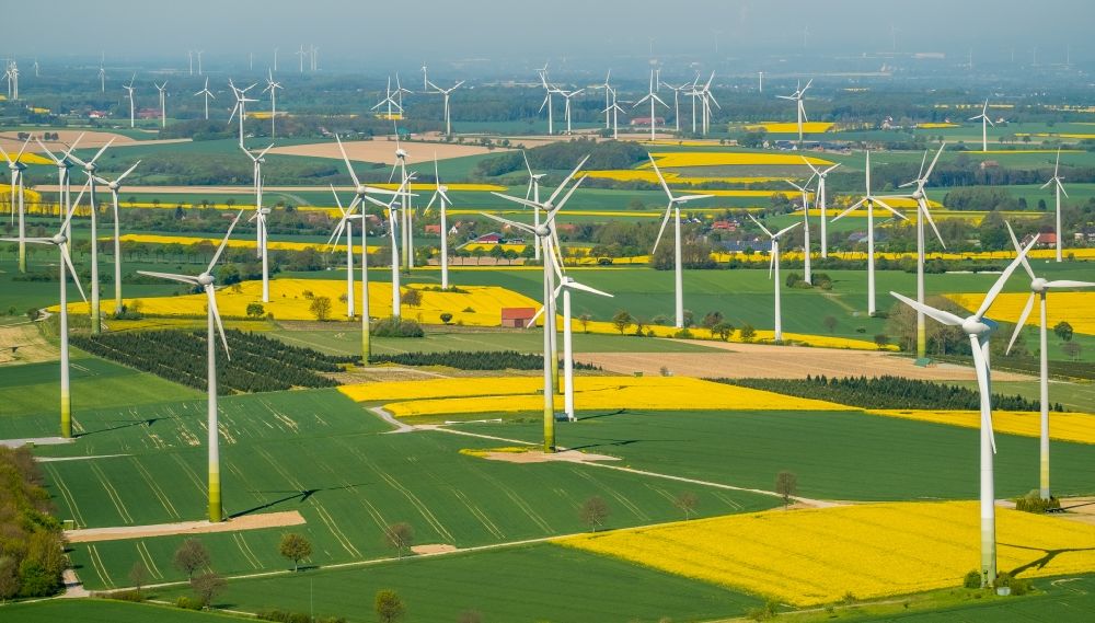 Rüthen from the bird's eye view: Wind turbine windmills on a field in Ruethen in the state North Rhine-Westphalia, Germany