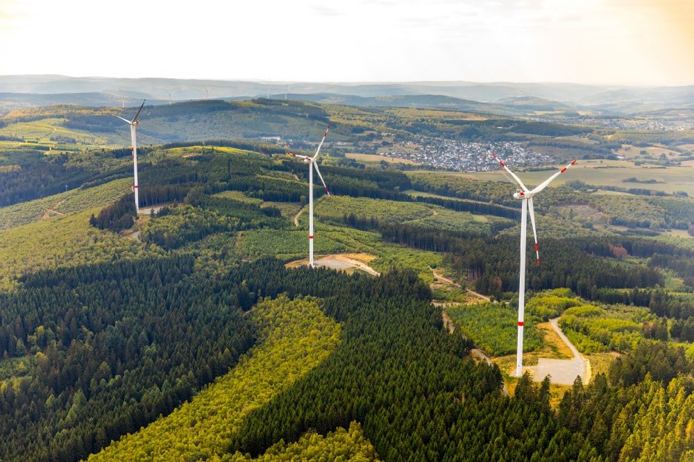 Haiger from the bird's eye view: Wind turbine windmills (WEA) in a forest area in Haiger in the state Hesse, Germany