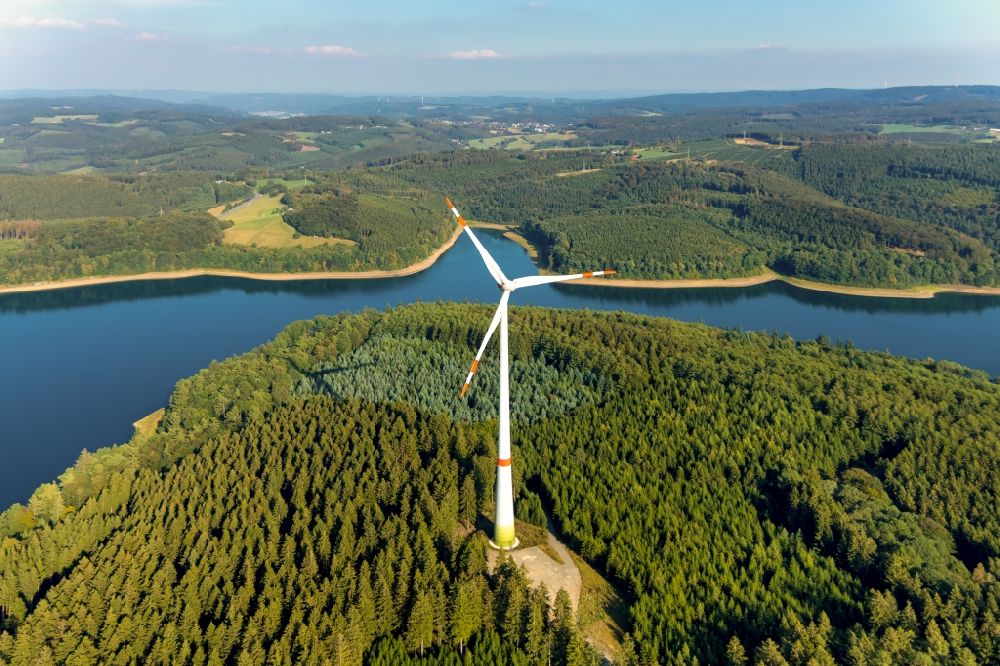 Aerial image Lüdenscheid - Wind turbine windmills (WEA) in a forest area overlooking the Versetalsperre of the Verse in Luedenscheid in the state North Rhine-Westphalia, Germany