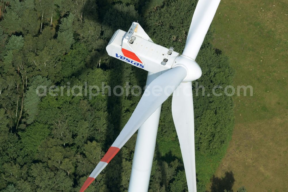 Sallgast from the bird's eye view: Wind turbine of Vestas Wind Systems on the edge of the forest wind farm of Goellnitz-Lieskau-Rehain in Sallgast in the state of Brandenburg