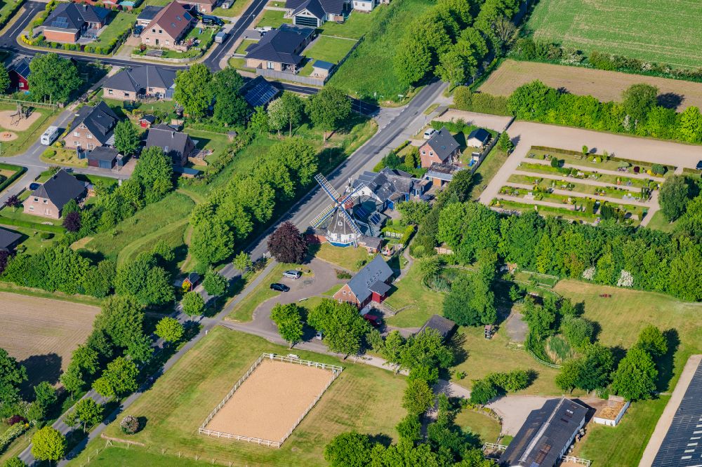 Aerial image Achtrup - Historic windmill on a farm homestead on the edge of cultivated fields on street Lecker Strasse in Achtrup in the state Schleswig-Holstein, Germany