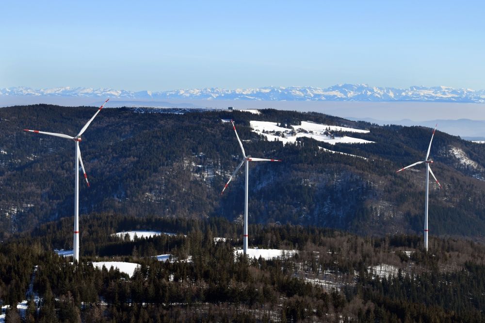Aerial photograph schopfheim - Looking over the wind turbines of the wind farms in the Southern Black Forest in Hasel, Baden-Wurttemberg. At the horizon the snow covered Swiss Alps