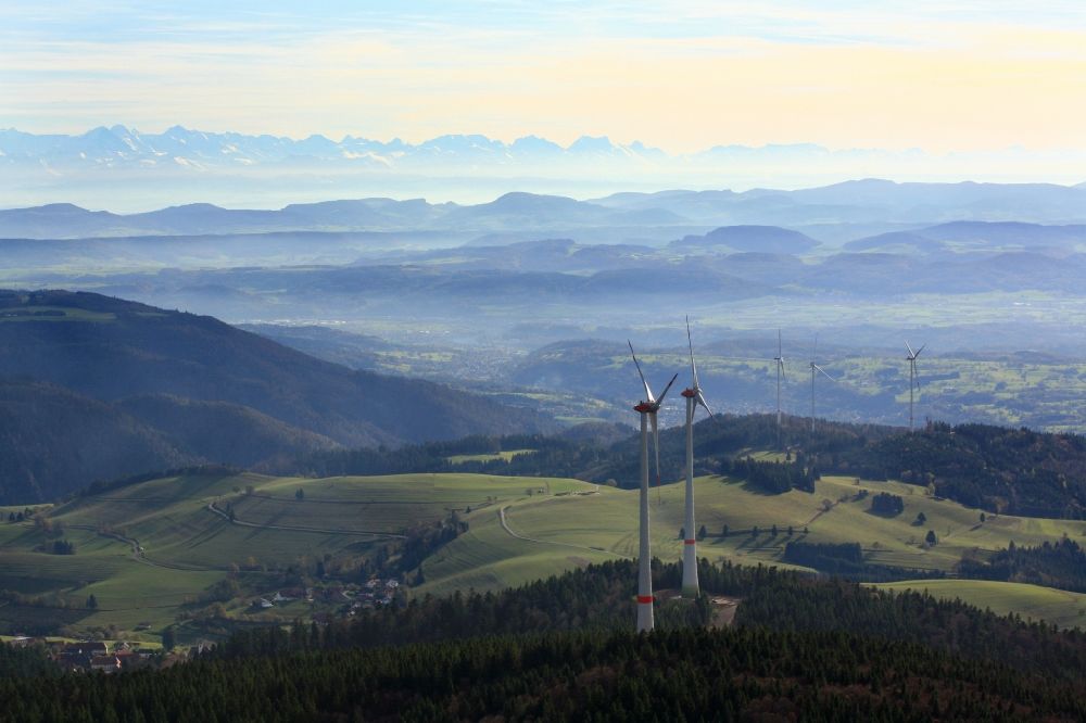 Aerial photograph Hasel - Looking over the wind turbines of the wind farms Rohrenkopf and Glaserkopf in the Southern Black Forest in Gersbach and in Hasel, Baden-Wuerttemberg. At the horizon the Swiss Alps