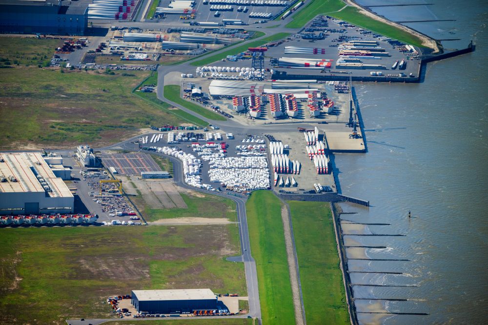 Cuxhaven from above - Storage and open spaces of the wind turbine assembly and production facility in the industrial area of the Siemens offshore wind turbine plant in Cuxhaven in the state Lower Saxony, Germany