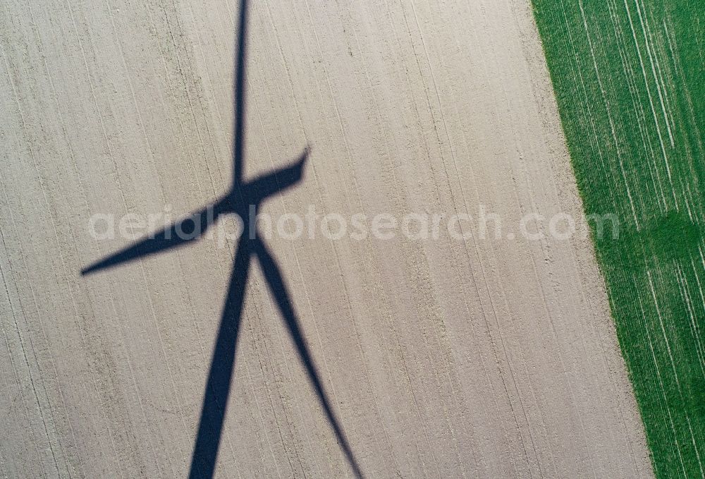 Sieversdorf from above - Shadow of a wind turbine (WEA) - wind turbine on a field in Sieversdorf in the state Brandenburg, Germany