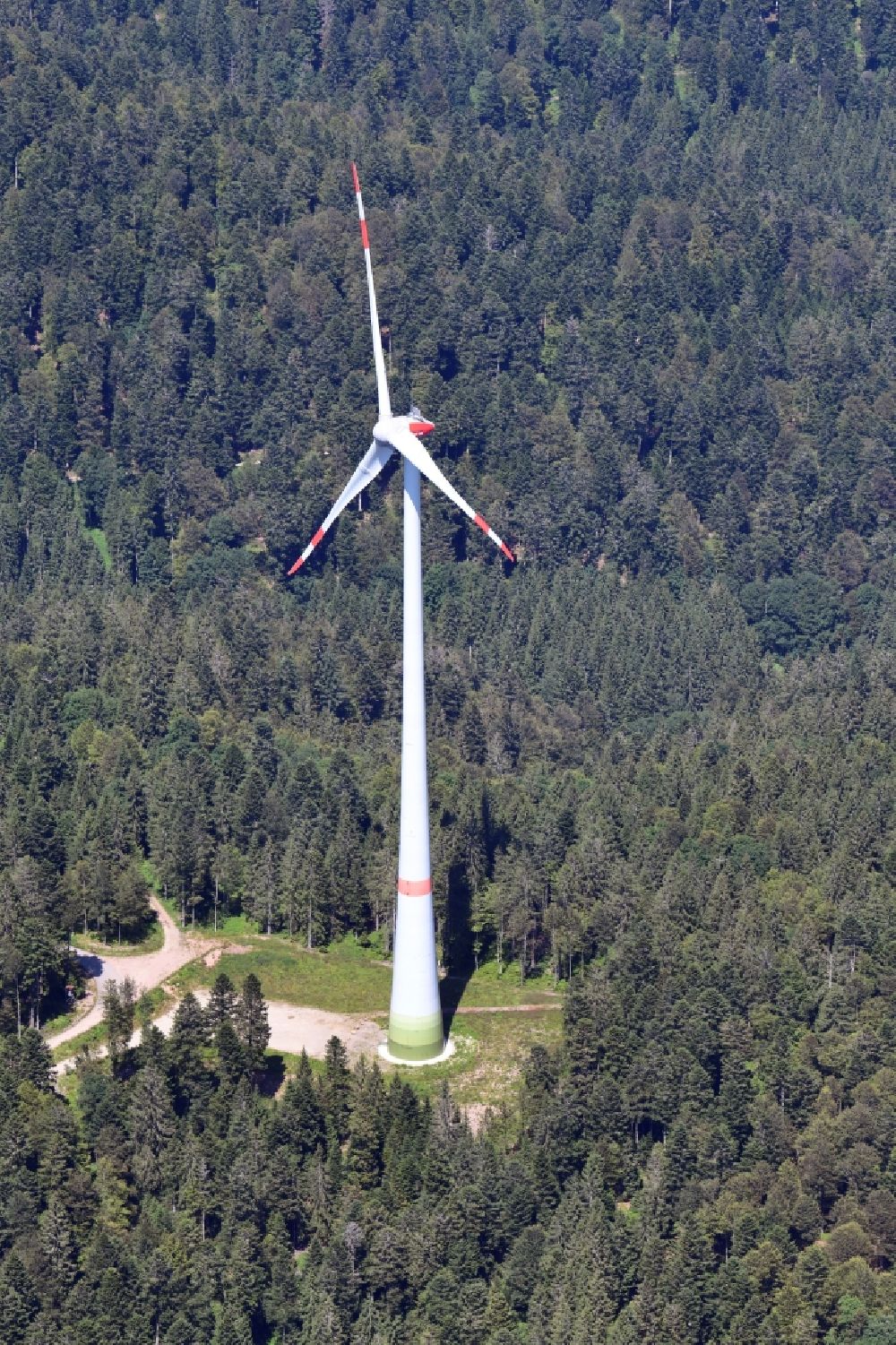 Schopfheim from above - A wind turbine on the Rohrenkopf, the local mountain of Gersbach, a district of Schopfheim in Baden-Wuerttemberg. It was the first wind farm in the south of the Black Forest