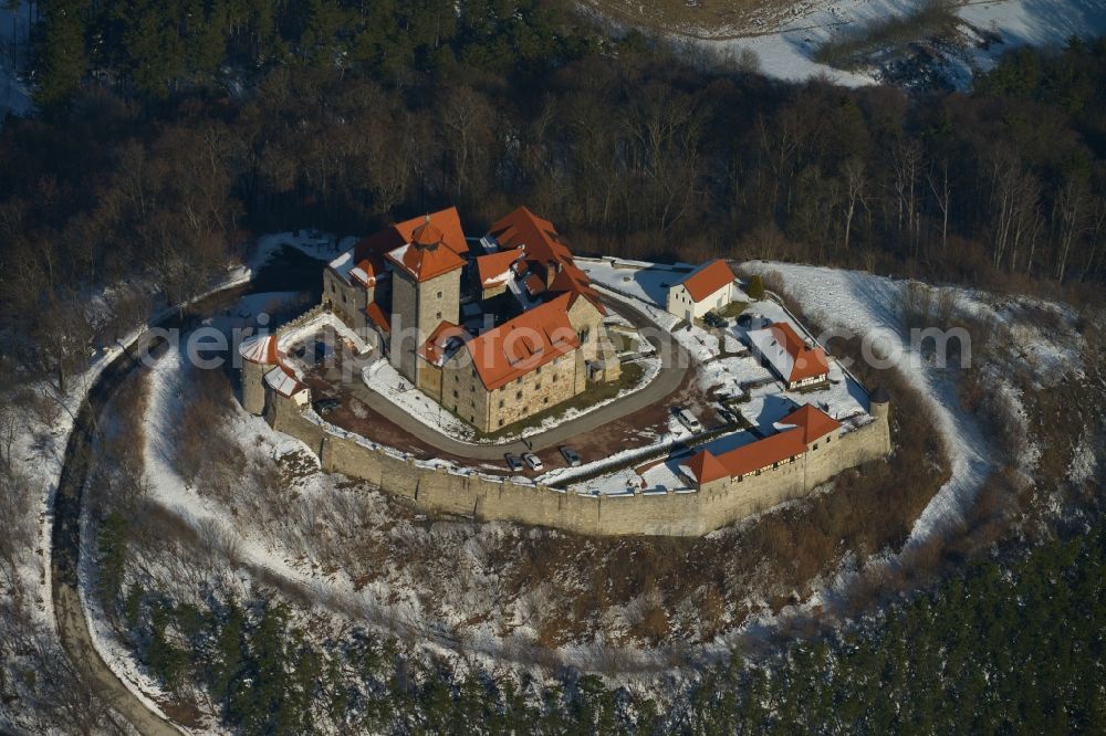 Holzhausen from the bird's eye view: Winter covered with snow mountains of the ruin of the castle grow at Holzhausen in Thuringia