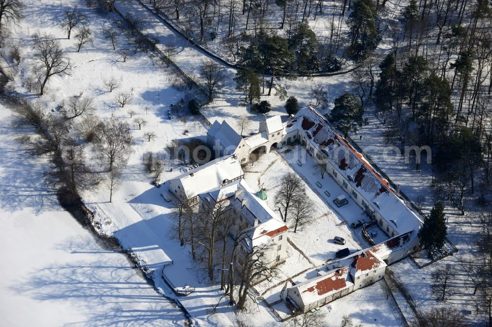 Berlin from the bird's eye view: Winter covered with snow castle Grunewald at Grunewaldsee in Berlin