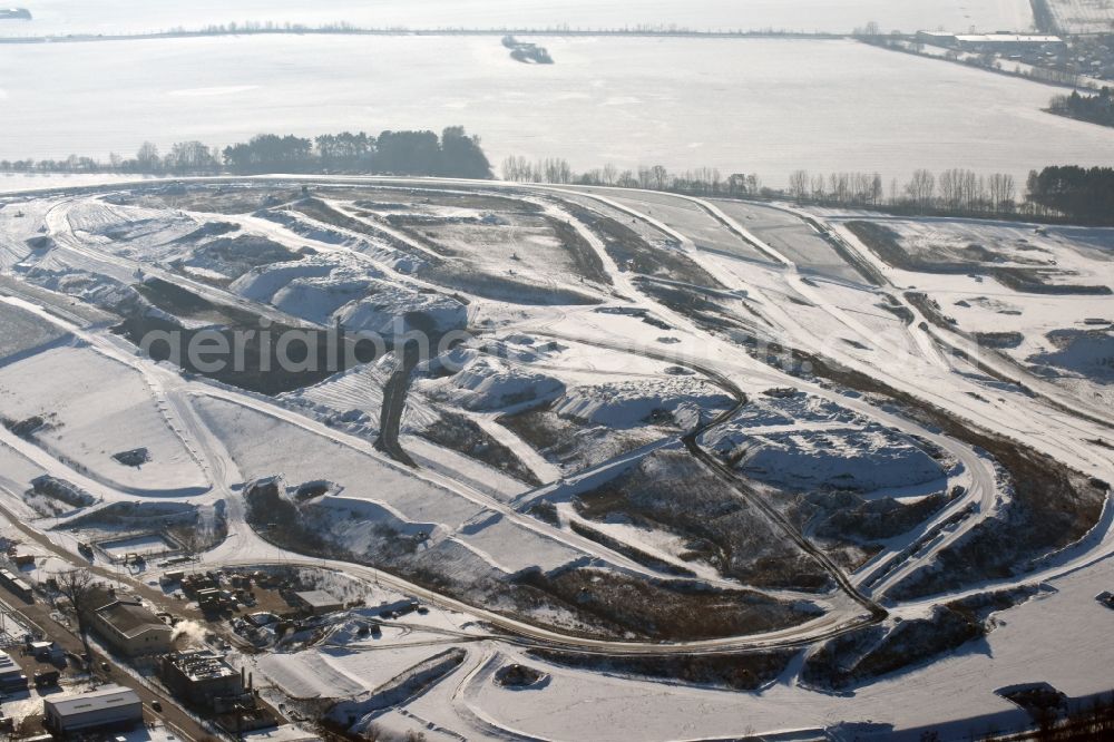 Aerial photograph - Winterly snowy view of the dump Schwanebeck in the state Brandenburg