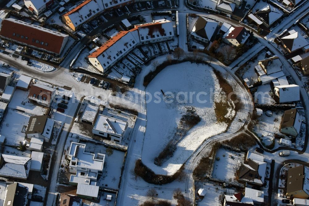 Magdeburg from the bird's eye view: Wintry snowy new built single family house settlement Am Birnengarten in the district Ottersleben in Magdeburg in the federal state Saxony-Anhalt. Responsible for the developement is the MAWOG Grundstuecks GmbH