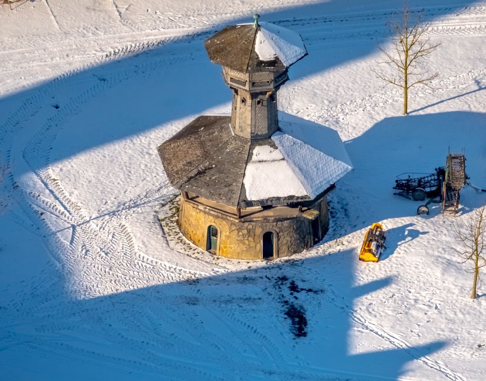 Arnsberg from the bird's eye view: Wintry snowy historical dovecote on the area of the cloister of Oelinghausen in the district felling trees in Arnsberg in the federal state North Rhine-Westphalia