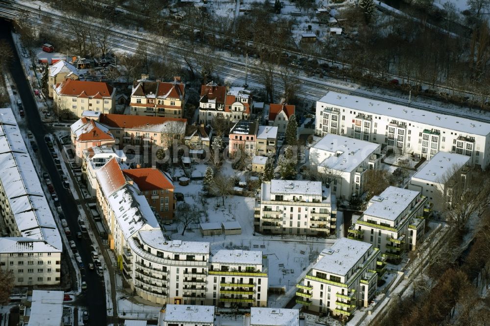 Aerial image Berlin - Wintry snowy new construction Wohnpark am Wuhle-Ufer in the district of Koepenick in Berlin