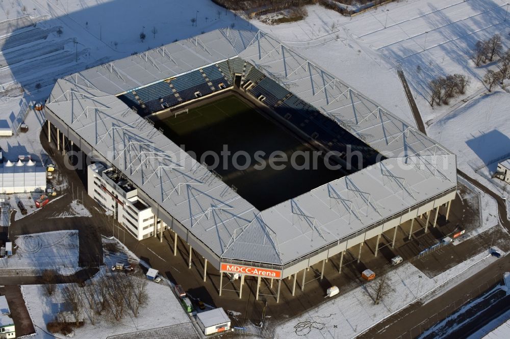 Aerial photograph Magdeburg - Wintry snowy sports facility grounds of the MDCC Arena stadium in Magdeburg in the state Saxony-Anhalt