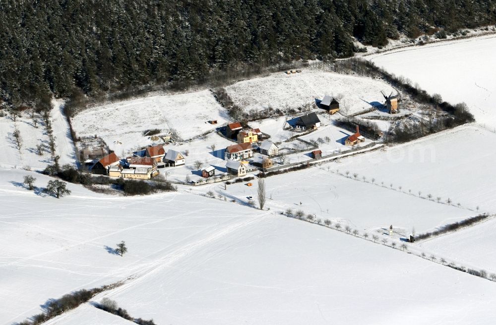 Hohenfelden from above - Wintry snow-covered outdoor museum of Thuringia in Hohenfelden in the state of Thuringia