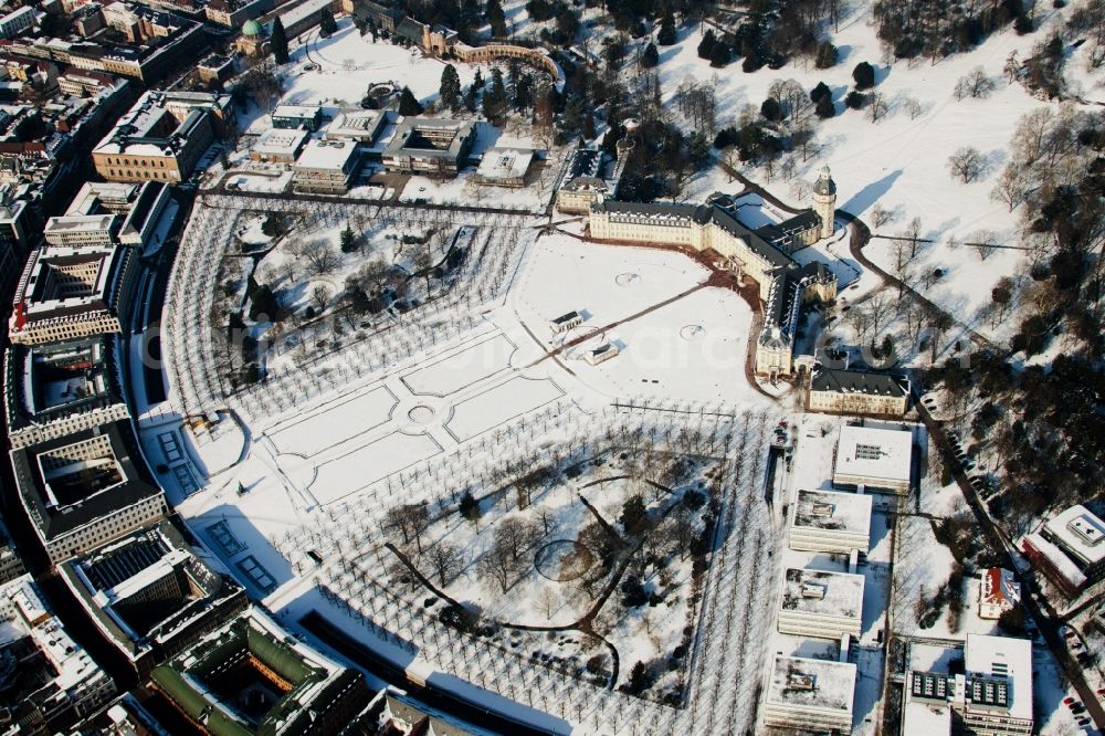 Aerial photograph Karlsruhe - Winterly snow in the park of the castle Karlsruher Schloss in Karlsruhe in the state Baden-Wuerttemberg