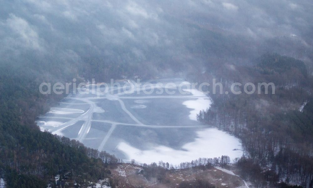Aerial image Spechthausen - Wintry, icy Schwaerzesee near Spechthausen in the state Brandenburg