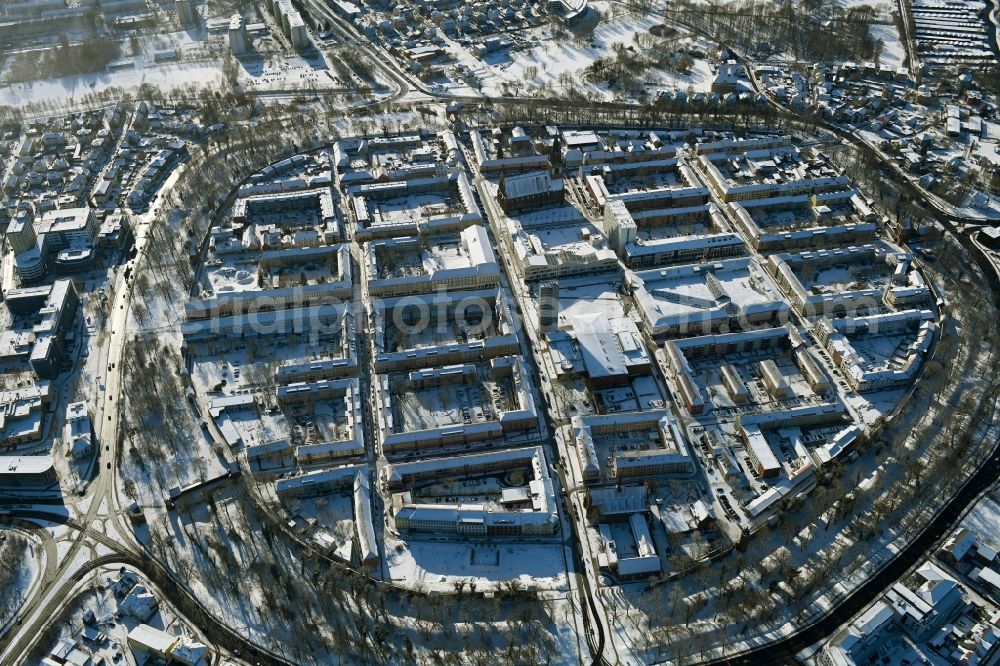Neubrandenburg from the bird's eye view: Wintry snowy old Town area and city center in Neubrandenburg in the state Mecklenburg - Western Pomerania, Germany