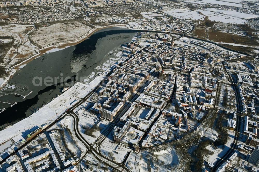 Aerial image Rostock - Wintry snowy old Town area and city center on shore of Unterwarnow in Rostock in the state Mecklenburg - Western Pomerania, Germany