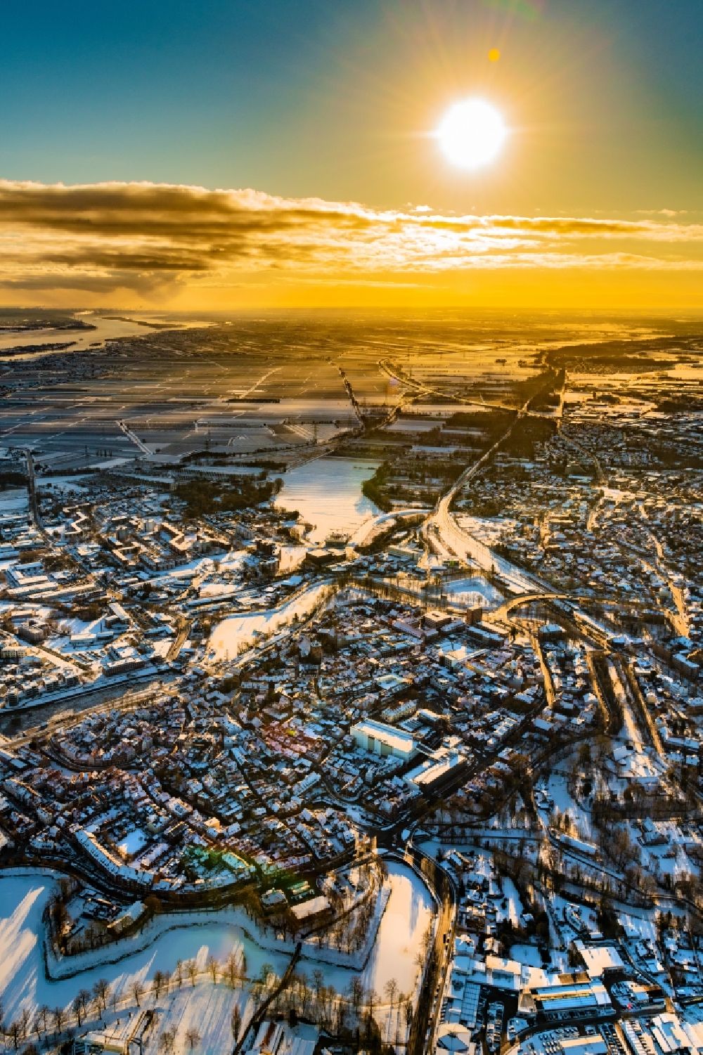 Stade from above - Wintry snowy old town area and inner city center in Stade in the state Lower Saxony, Germany