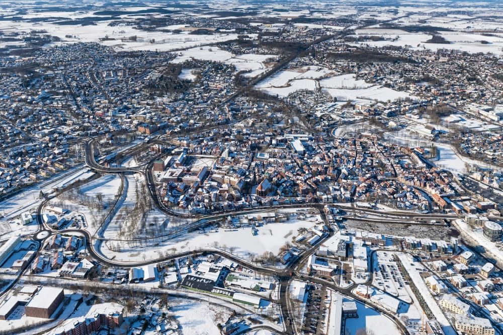 Aerial image Stade - Wintry snowy old town area and inner city center in Stade in the state Lower Saxony, Germany