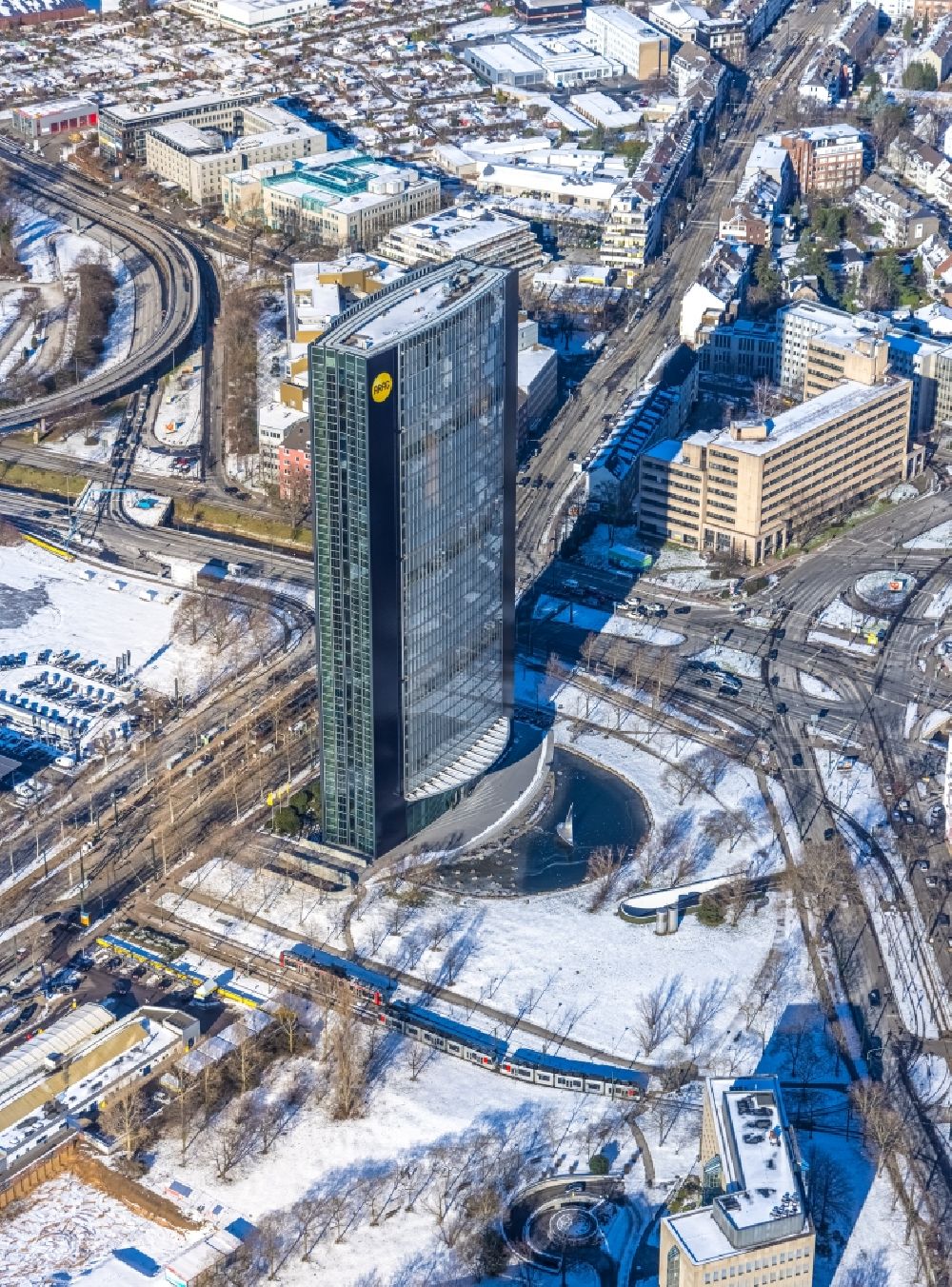 Aerial image Düsseldorf - Wintry snowy office and administration buildings ARAG-Tower of the insurance company ARAG SE at the Muensterstrasse in Duesseldorf at Ruhrgebiet in the state North Rhine-Westphalia